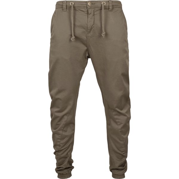 Spodnie Urban Classic stretch. Zielone spodnie materiałowe męskie Urban Classics, bez wzorów. Za 237.00 zł.