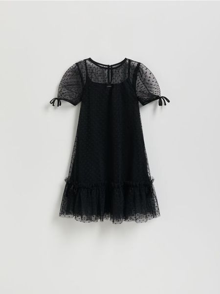 Sukienka w groszki - czarny. Czarne sukienki dziewczęce Reserved, bez wzorów, bez ramiączek. W wyprzedaży za 45.99 zł.