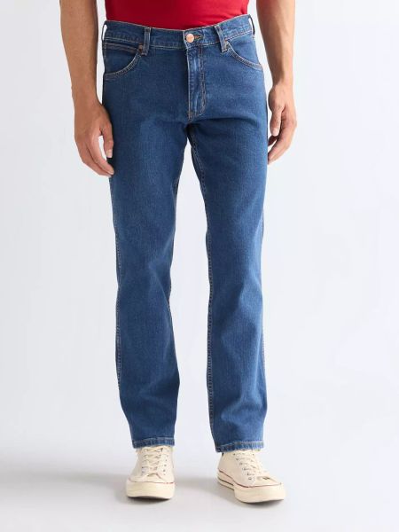 MĘSKIE SPODNIE WRANGLER GREENSBORO BLUE TOMORROW 112338770. Niebieskie spodnie materiałowe męskie Wrangler, bez wzorów, z jeansu. Za 239.99 zł.