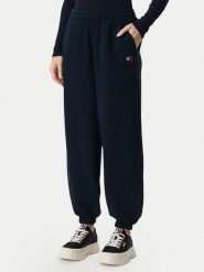 Tommy Jeans Spodnie dresowe Badge DW0DW23536 Granatowy Regular Fit. Niebieskie spodnie dresowe damskie Tommy Jeans, xxs, bez wzorów, z bawełny. Za 329.99 zł.