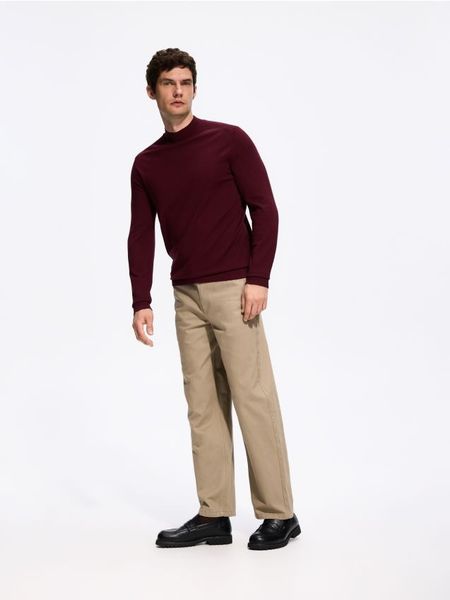 Spodnie wide leg - beżowy. Brązowe spodnie materiałowe męskie Reserved, bez wzorów, z bawełny. Za 159.99 zł.