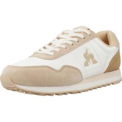 Kapcie LE COQ SPORTIF ASTRA_2 Jasnobrązowy. Białe kapcie damskie Le Coq Sportif, z materiału. Za 331.50 zł.