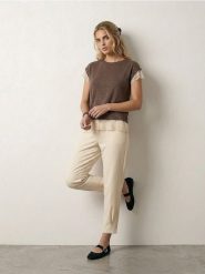 Spodnie barrel leg z domieszką wiskozy - kremowy. Białe spodnie materiałowe damskie Sinsay, bez wzorów, z wiskozy. Za 49.99 zł.
