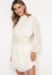 Jasnobeżowa Elegancka Sukienka z Błyszczącymi Drobinkami i Falbankami Tinaria. Brązowe sukienki damskie Born2be, l, bez wzorów, eleganckie, bez kołnierzyka, bez ramiączek, mini. W wyprzedaży za 135.99 zł.