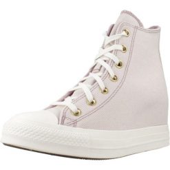 Buty CONVERSE CHUCK TAYLOR ALL STAR WEDGE Fioletowy. Fioletowe buty sportowe na co dzień damskie Converse, bez wzorów, z tkaniny. Za 388.99 zł.