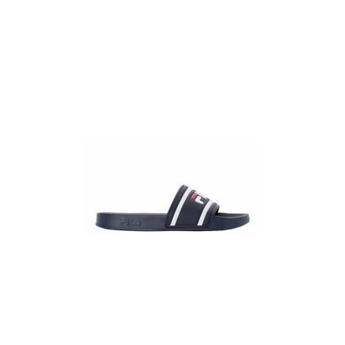 Klapki damskie Fila Morro Bay Slipper. Niebieskie klapki damskie Fila, bez wzorów, z materiału, bez obcasa. Za 96.37 zł.