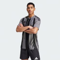 Koszulka Striped 24. Czarne t-shirty sportowe męskie Adidas, s, z materiału, bez ramiączek, do piłki nożnej. Za 129.00 zł.