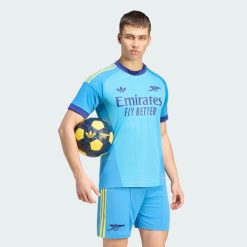 Koszulka wyjazdowa bramkarska Arsenal FC 26/27. Niebieskie t-shirty sportowe męskie Adidas, l, z materiału, bez ramiączek, do piłki nożnej, climacool (adidas). Za 439.00 zł.