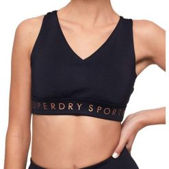 Top sportowy damski Superdry Active Studio. Niebieskie topy sportowe damskie Superdry., l, bez wzorów, bez ramiączek. W wyprzedaży za 112.00 zł.