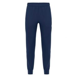 Spodnie treningowe Macron Heracles. Niebieskie spodnie materiałowe męskie Macron, bez wzorów, sportowe. Za 216.00 zł.