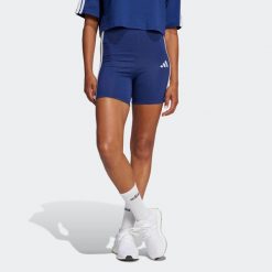 Spodenki fitness damskie ADIDAS. Niebieskie spodenki sportowe damskie Adidas, bez wzorów, z bawełny, sportowe. W wyprzedaży za 89.99 zł.