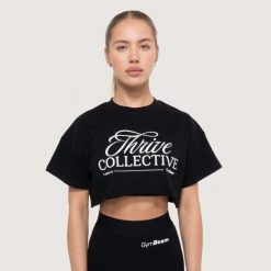 Koszulka damska fitness oversize czarna Thrive Cropped. Czarne bluzki sportowe damskie GYMBEAM, m, bez wzorów, z bawełny, bez ramiączek. Za 80.90 zł.