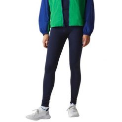 Legginsy treningowe damskie Lacoste. Niebieskie legginsy sportowe damskie Lacoste, uniwersalny, bez wzorów, z materiału, na fitness i siłownię. Za 317.00 zł.
