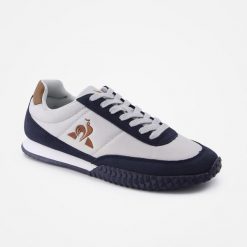 Buty sportowe damskie Veloce Ripstop ombre blue. Niebieskie buty sportowe na co dzień damskie Le Coq Sportif, bez wzorów, trekkingowe. W wyprzedaży za 371.25 zł.