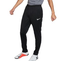 Męskie Spodnie Do Biegania Park 20. Czarne spodnie materiałowe męskie Nike, bez wzorów, z materiału. Za 158.99 zł.