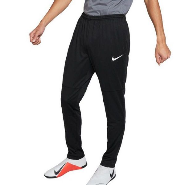 Męskie Spodnie Do Biegania Park 20. Czarne spodnie materiałowe męskie Nike, bez wzorów, z materiału. Za 160.99 zł.