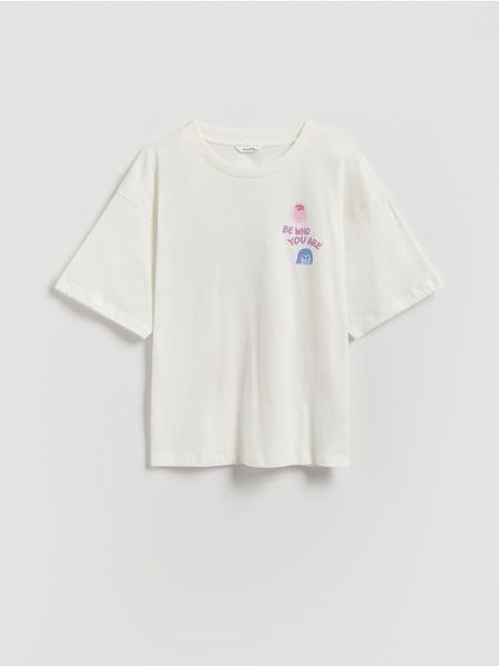 T-shirt z nadrukiem Inside Out - złamana biel. Koszulki dziewczęce Reserved, bez wzorów, z bawełny, bez ramiączek. Za 39.99 zł.