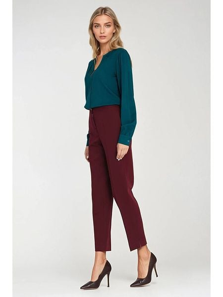 Nife Spodnie w kolorze czerwonym rozmiar: 38. Czerwone spodnie materiałowe damskie Nife, bez wzorów, z materiału, z podwyższonym stanem. Za 166.10 zł.