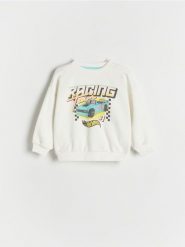 Bluza oversize Hot Wheels - złamana biel. Bluzy i bluzki niemowlęce Reserved, bez wzorów, z bawełny, bez ramiączek, bez kaptura. W wyprzedaży za 22.99 zł.