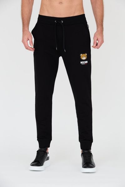 MOSCHINO Czarne męskie spodnie dresowe, Rozmiar L. Czarne spodnie dresowe męskie MOSCHINO, bez wzorów, z dresówki. W wyprzedaży za 570.99 zł.