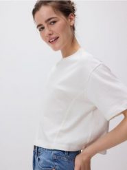 T-shirt boxy - złamana biel. T-shirty damskie Reserved, l, bez wzorów, z bawełny, bez kołnierzyka. W wyprzedaży za 29.99 zł.