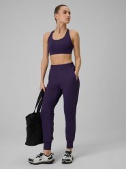 4F Spodnie treningowe szybkoschnące damskie - fioletowe L. Fioletowe spodnie sportowe damskie 4f, l, na fitness i siłownię. Za 179.99 zł.