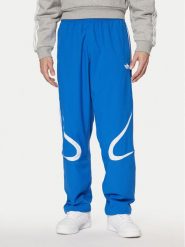 Adidas Spodnie dresowe adicolor Teamgeist JP1120 Niebieski Regular Fit. Niebieskie spodnie dresowe męskie Adidas, bez wzorów, z dresówki. Za 209.99 zł.