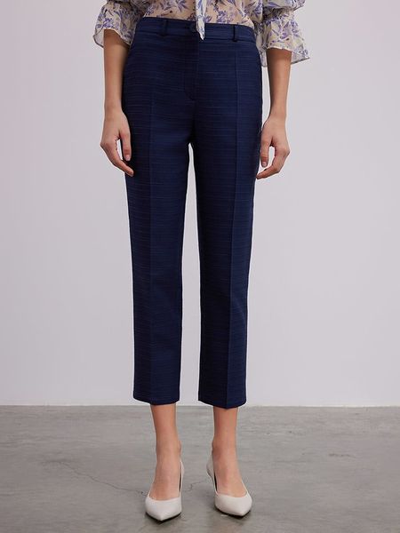 BGN Spodnie w kolorze granatowym rozmiar: 36. Niebieskie spodnie materiałowe damskie BGN, bez wzorów, z materiału, z podwyższonym stanem. Za 86.99 zł.