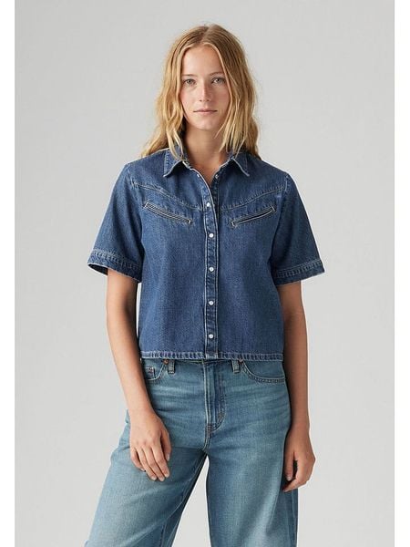 Levi's Koszula dżinsowa w kolorze niebieskim rozmiar: L. Niebieskie koszule damskie Levi's, l, bez wzorów, z bawełny, bez kołnierzyka, bez ramiączek. Za 145.60 zł.
