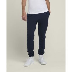 Spodnie tenisowe męskie Wilson Team Jogger. Spodnie materiałowe męskie Wilson, bez wzorów, sportowe. Za 219.99 zł.