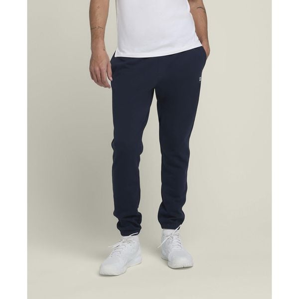 Spodnie tenisowe męskie Wilson Team Jogger. Spodnie materiałowe męskie Wilson, bez wzorów, sportowe. Za 219.99 zł.
