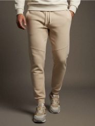 Spodnie jogger dresowe pique - beżowy. Brązowe spodnie sportowe męskie Sinsay, z dresówki. Za 35.99 zł.