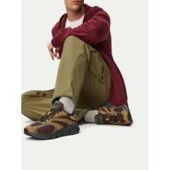 Buty do biegania Reebok. Brązowe obuwie do biegania damskie Reebok. Za 359.99 zł.