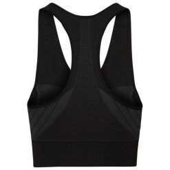 Top sportowy damski Seamless Medium. Czarne topy sportowe damskie Odlo, s, bez wzorów, z materiału, bez ramiączek. Za 219.99 zł.