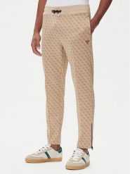Guess Spodnie dresowe Z2BB05 K7122 Beżowy Regular Fit. Brązowe spodnie dresowe męskie Guess, z aplikacjami, z dresówki. Za 349.99 zł.