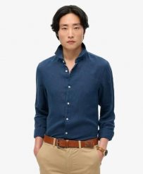 Superdry Koszula lniana Vacation z długim rękawem – NAVY. Niebieskie koszule damskie Superdry., na lato, xl, bez wzorów, ze lnu, klasyczne, bez kołnierzyka, bez ramiączek. Za 317.00 zł.