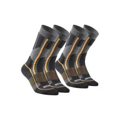 Skarpety turystyczne SH520 X-WARM MID. Szare skarpetki damskie QUECHUA, bez wzorów, z elastanu. Za 59.99 zł.