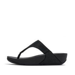 Klapki między palcami damskie FitFlop Lulu Shimmerglitz. Czarne obuwie trekkingowe damskie FIT FLOP, na lato. Za 443.50 zł.