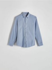 Bawełniana koszula regular fit - niebieski. Niebieskie koszule męskie Reserved, l, bez wzorów, z bawełny, bez kołnierzyka, bez ramiączek. W wyprzedaży za 65.99 zł.