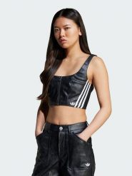 Adidas Top "Originals Adilenium Season 3" w kolorze czarnym ze skóry syntetycznej rozmiar: 38. Czarne topy damskie Adidas, bez wzorów, ze skóry, bez kołnierzyka. Za 110.45 zł.
