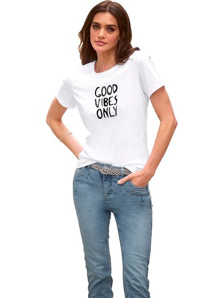 Heine Koszulka w kolorze białym rozmiar: 42. Białe bluzki damskie Heine, bez wzorów, bez kołnierzyka, bez ramiączek. Za 34.99 zł.