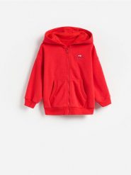 Bawełniana bluza oversize - czerwony. Czerwone bluzy i bluzki niemowlęce Reserved, bez wzorów, z bawełny, bez ramiączek, bez kaptura. Za 49.99 zł.