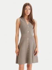 Guess Sukienka codzienna W6GK53 Z0658 Zielony Regular Fit. Zielone sukienki damskie Guess, na co dzień, xl, z aplikacjami, z syntetyku, bez kołnierzyka, bez ramiączek, proste. Za 669.99 zł.