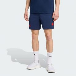 Szorty France Travel. Niebieskie szorty męskie Adidas, bez kołnierzyka. Za 279.00 zł.