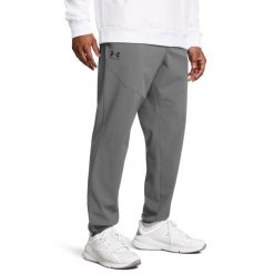 Under Armour VIBE WOVEN JOGGER Spodnie męskie. Szare spodnie sportowe męskie Under Armour, z materiału. Za 209.99 zł.