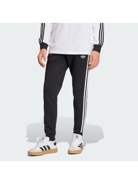 Adidas Spodnie dresowe 3-Stripes KE3562 Czarny Slim Fit. Czarne spodnie dresowe męskie Adidas, bez wzorów, z dresówki. Za 233.99 zł.