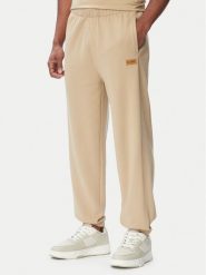 HUGO Spodnie dresowe Nevatro 50564047 Beżowy Regular Fit. Brązowe spodnie dresowe męskie Hugo, bez wzorów, z bawełny. Za 499.99 zł.