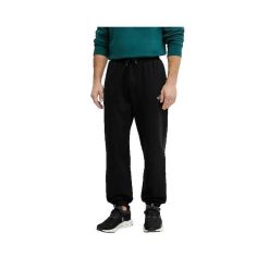 Spodnie The North Face Czarne Jogger Relaxed. Czarne spodnie dresowe męskie The North Face, z bawełny. Za 289.00 zł.