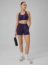 4F Spodenki treningowe szybkoschnące damskie - fioletowe L. Fioletowe szorty damskie 4f, bez wzorów, z podwyższonym stanem. Za 99.99 zł.