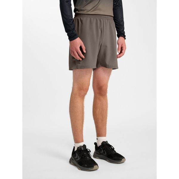 Szorty Newline Max. Brązowe szorty męskie Newline, bez wzorów, sportowe. Za 174.50 zł.